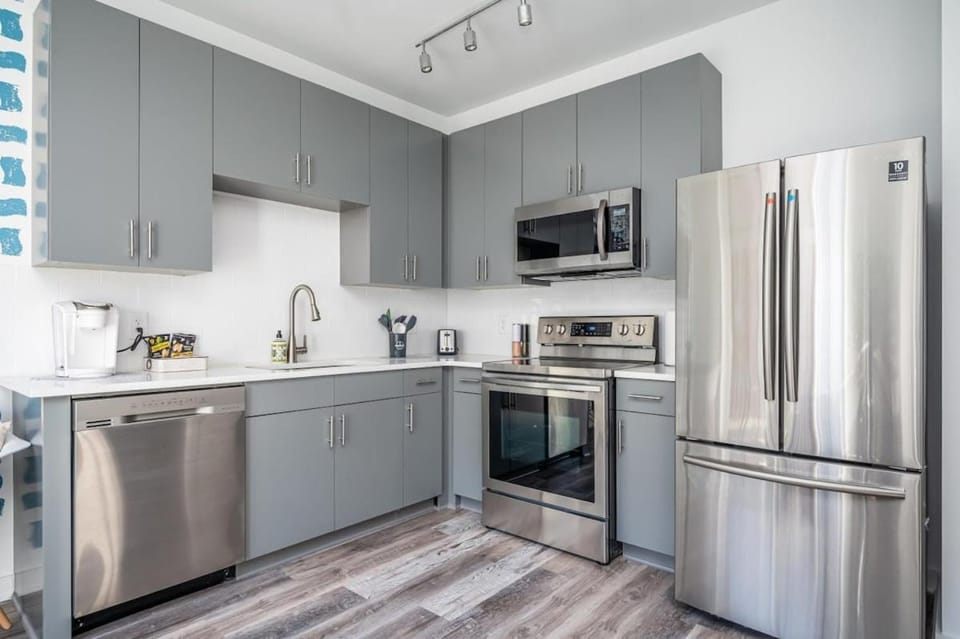 Kitchen or kitchenette, dishwasher, oven, stove, toaster
