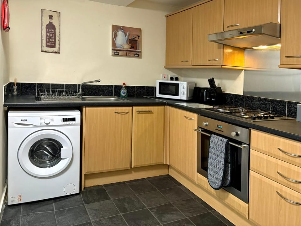 microwave, stove, washing machine, kitchen