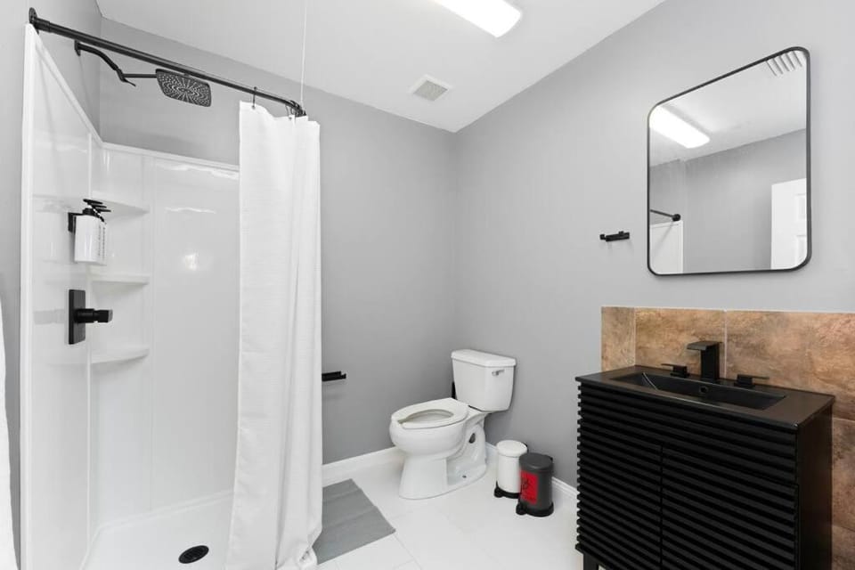 Plush 2 Bed Getaway With 100 Inch Projector & Sectional Apartment in Jacksonville
