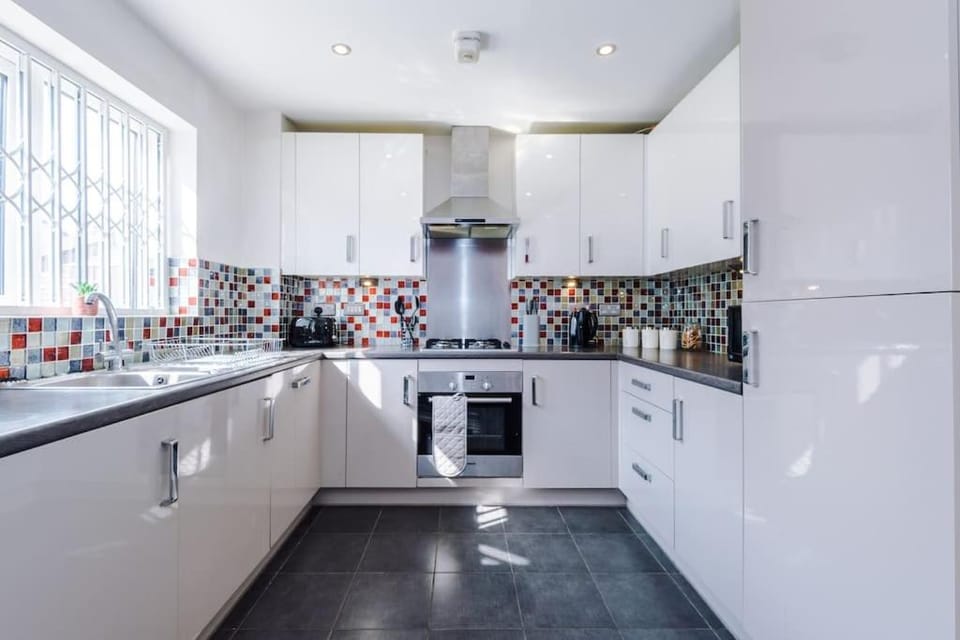 Kitchen or kitchenette, oven, stove, toaster