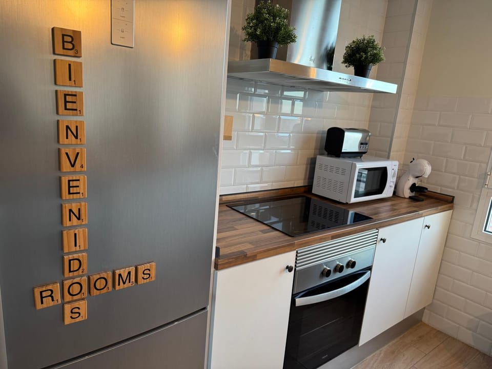 Kitchen or kitchenette, oven, stove