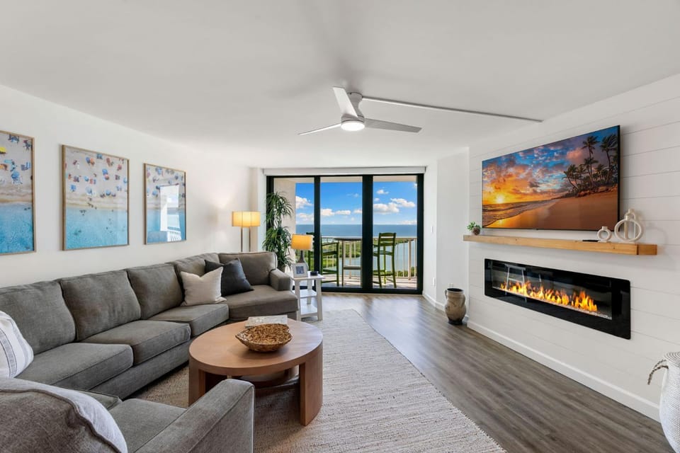 View (from property/room), Living room, Sea view, fireplace