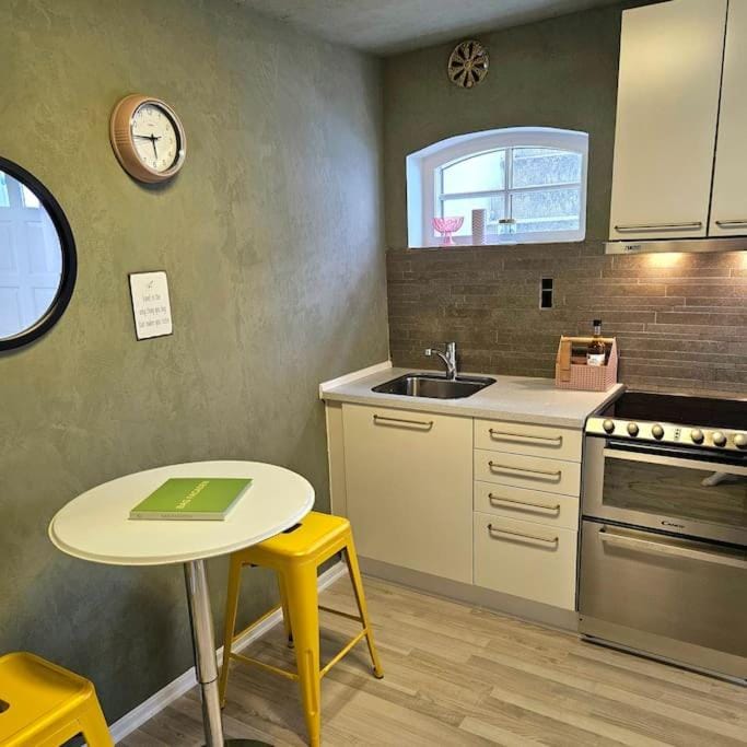 Kitchen or kitchenette, oven, stove