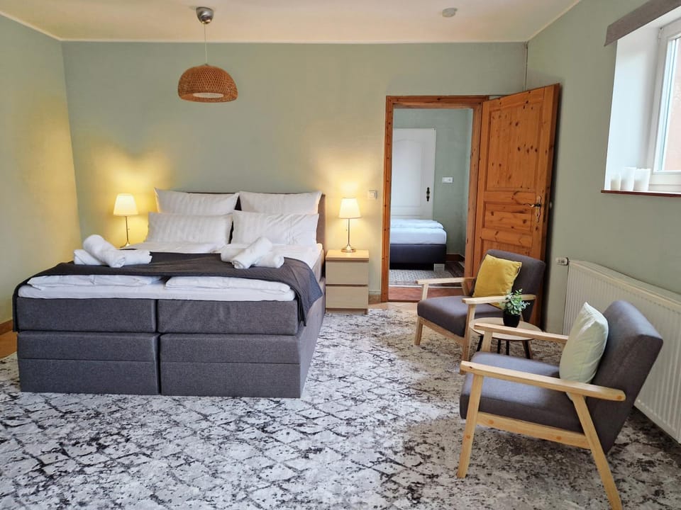 Bed, Living room, Seating area