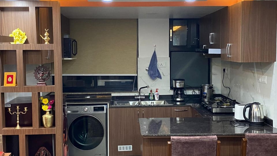 Coffee/tea facilities, Kitchen or kitchenette, oven, toaster, washing machine