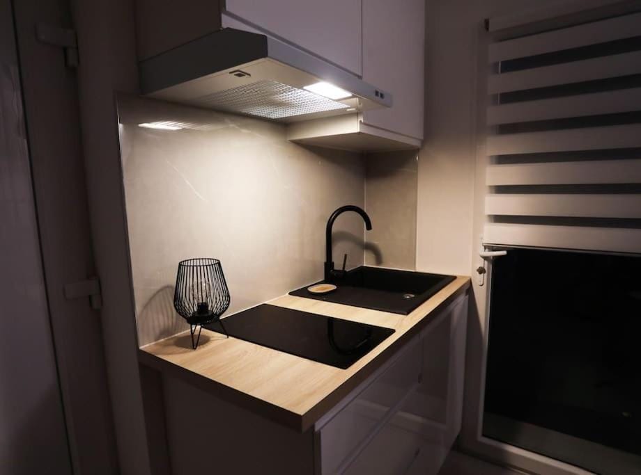 Kitchen or kitchenette, stove