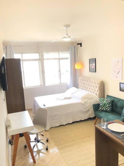 Bed, TV and multimedia, Living room, Seating area, Bedroom