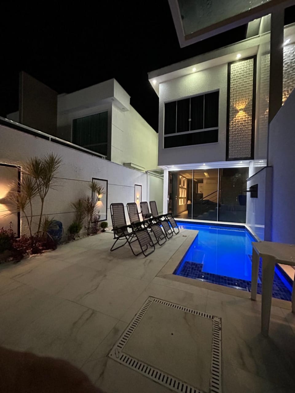 Property building, Patio, Night, Pool view, Swimming pool, sunbed