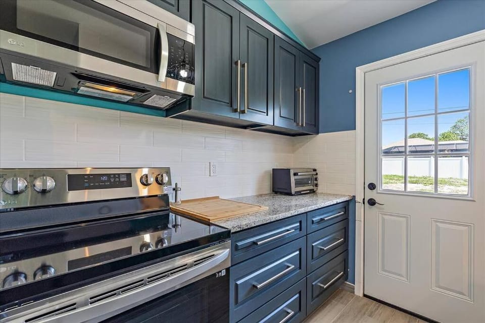 Kitchen or kitchenette, oven, stove, toaster