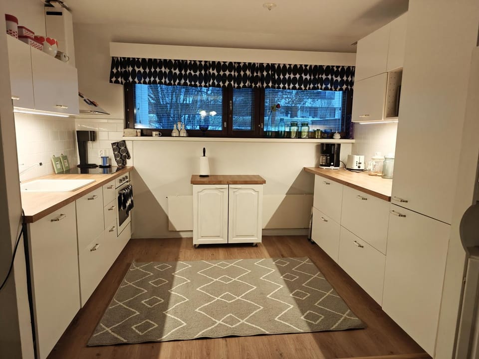 Kitchen or kitchenette, dishwasher, oven, stove