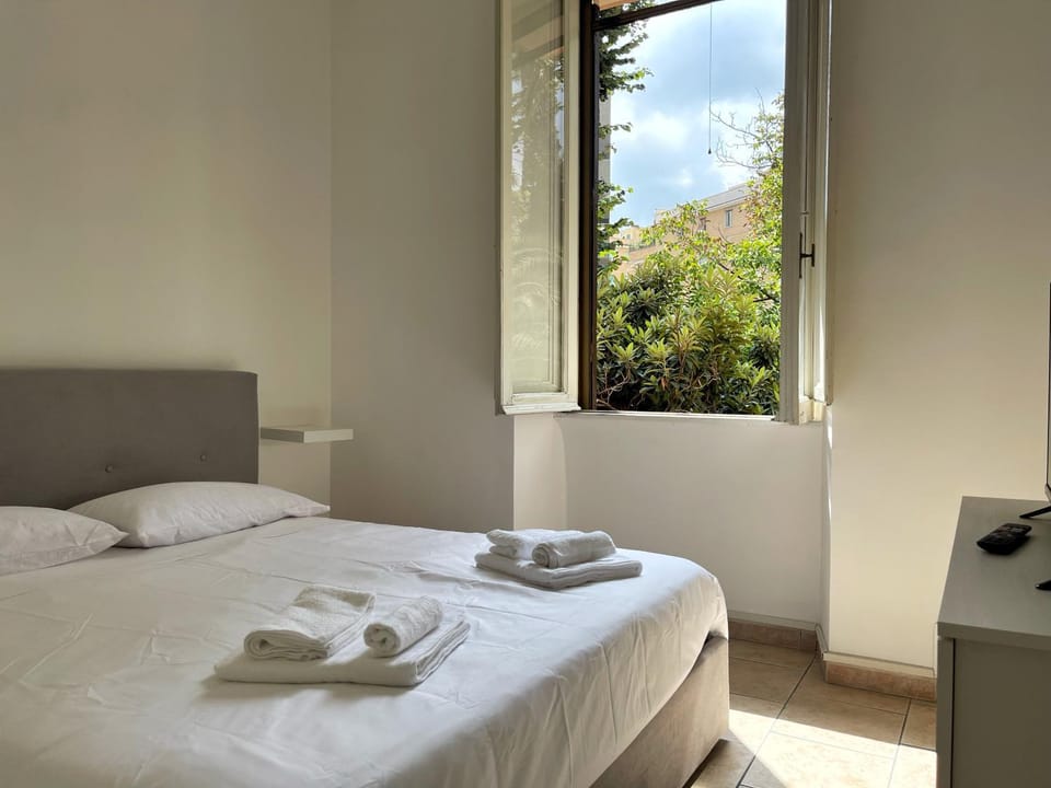 Bed, Garden view, towels