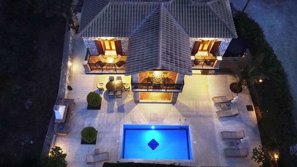 Patio, Night, Pool view, Swimming pool, sunbed