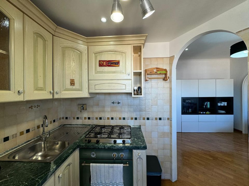 Kitchen or kitchenette, oven, stove