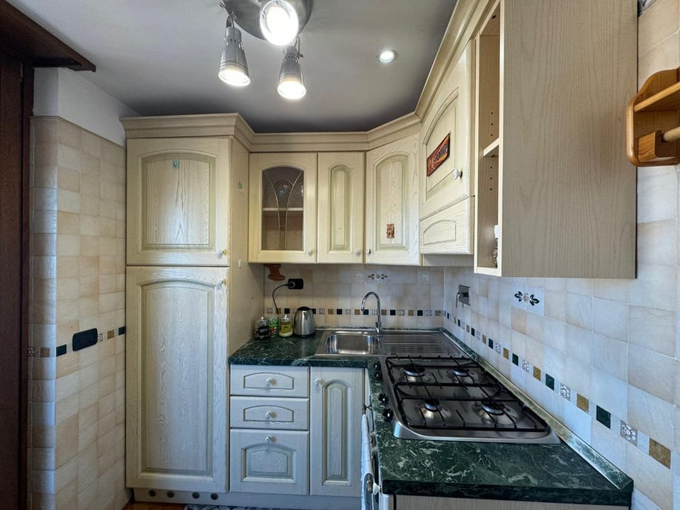 Kitchen or kitchenette, oven, stove