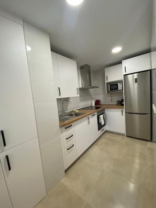 Kitchen or kitchenette, oven, stove