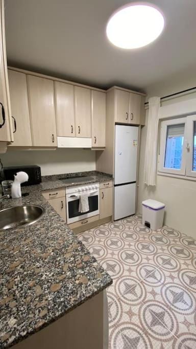 Kitchen or kitchenette, oven, stove