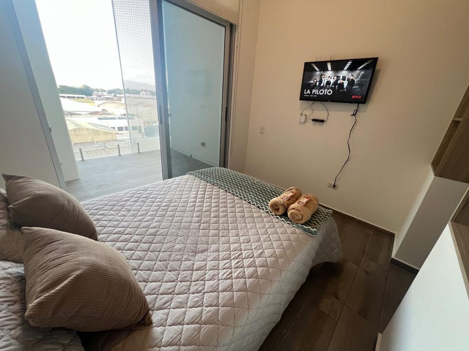 Apartamento a la par del aeropuerto con gran balcón 1 habitación! Apartment in Guatemala City