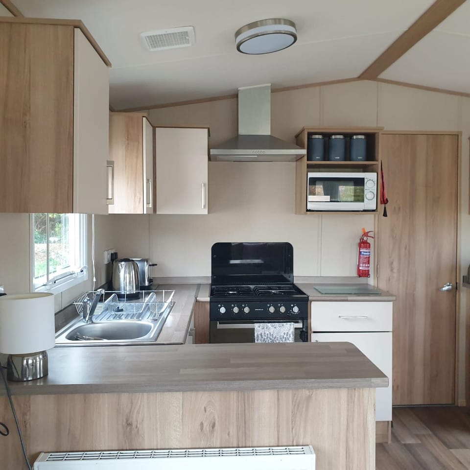 Caravan under the tree, Seton Sands Campground/ 
RV Resort in Scotland