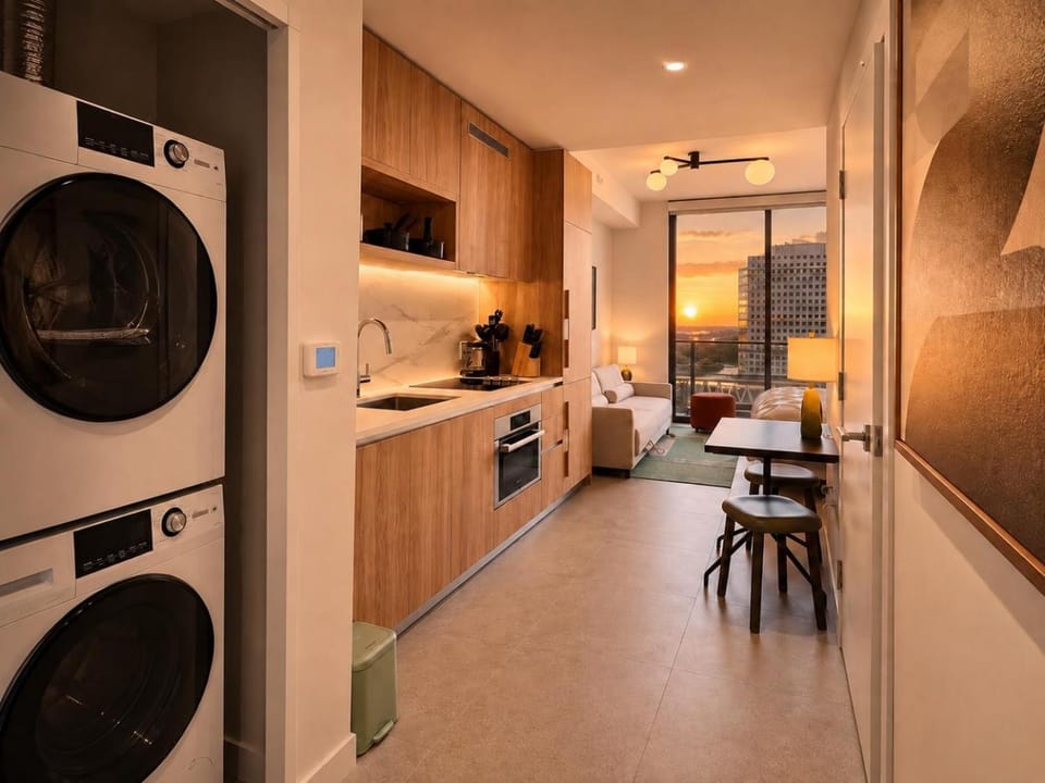 Kitchen or kitchenette, dishwasher, oven, stove, washing machine, dryer