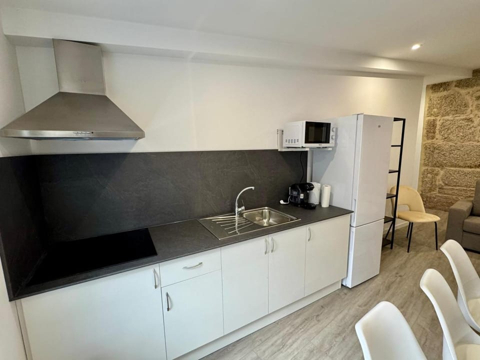 Kitchen or kitchenette, stove, kitchen