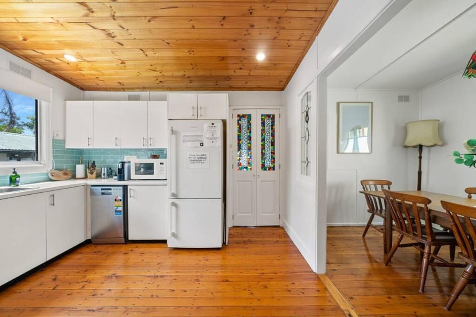 Kitchen or kitchenette, dishwasher, oven, stove