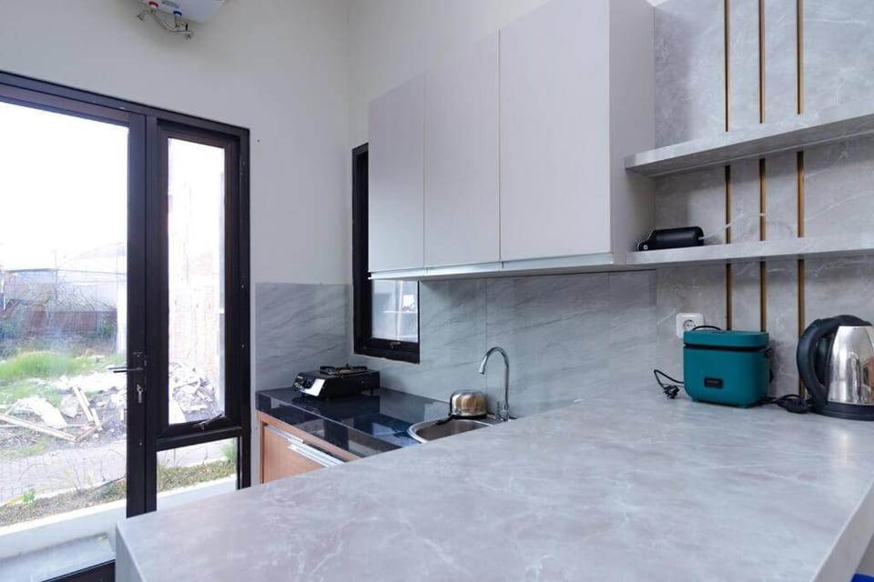 Villa Syariah Zamora B7 with Private Pool and Karaoke Villa in Batu