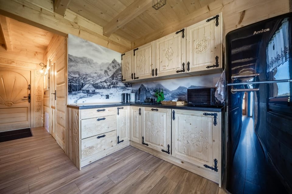Kitchen or kitchenette, dishwasher, oven, stove