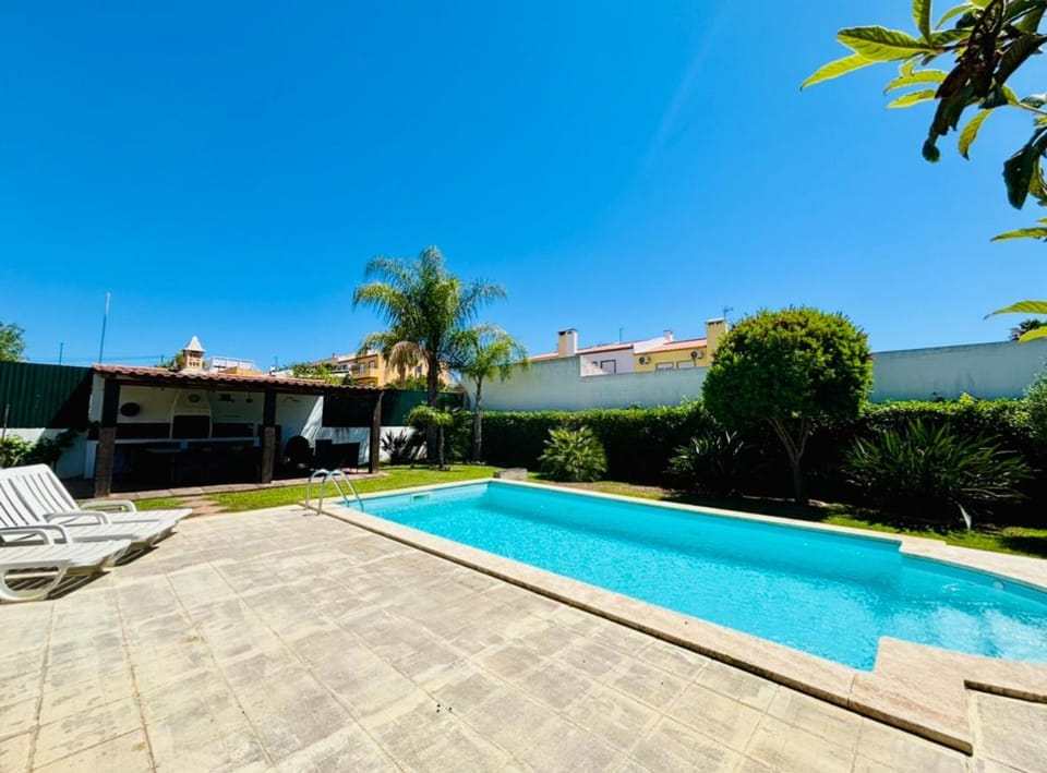 Swimming pool, sunbed