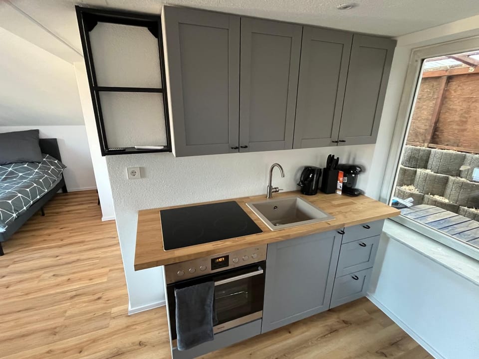 Kitchen or kitchenette, stove