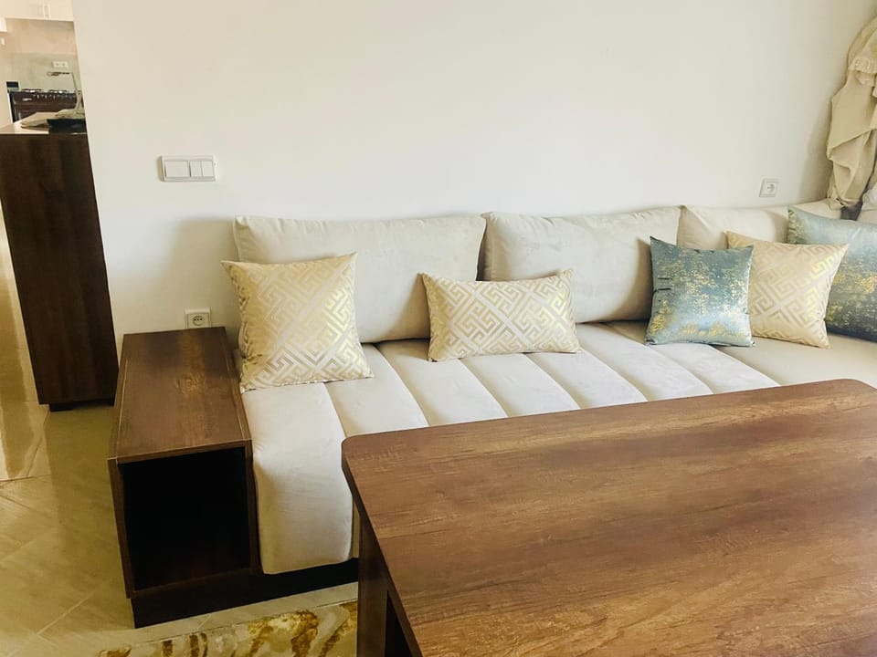 Bed, Living room, Seating area, Bedroom