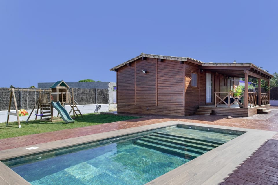 Property building, Living room, Swimming pool
