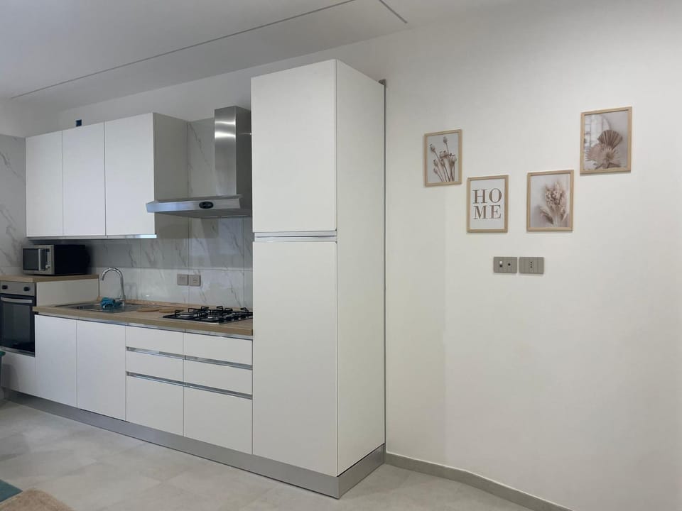 Kitchen or kitchenette, oven, stove