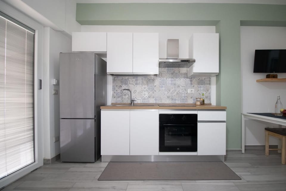 Kitchen or kitchenette, oven, stove