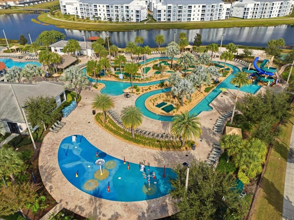 Property building, Day, Natural landscape, Bird's eye view, Children play ground, Aqua park, Pool view, Swimming pool