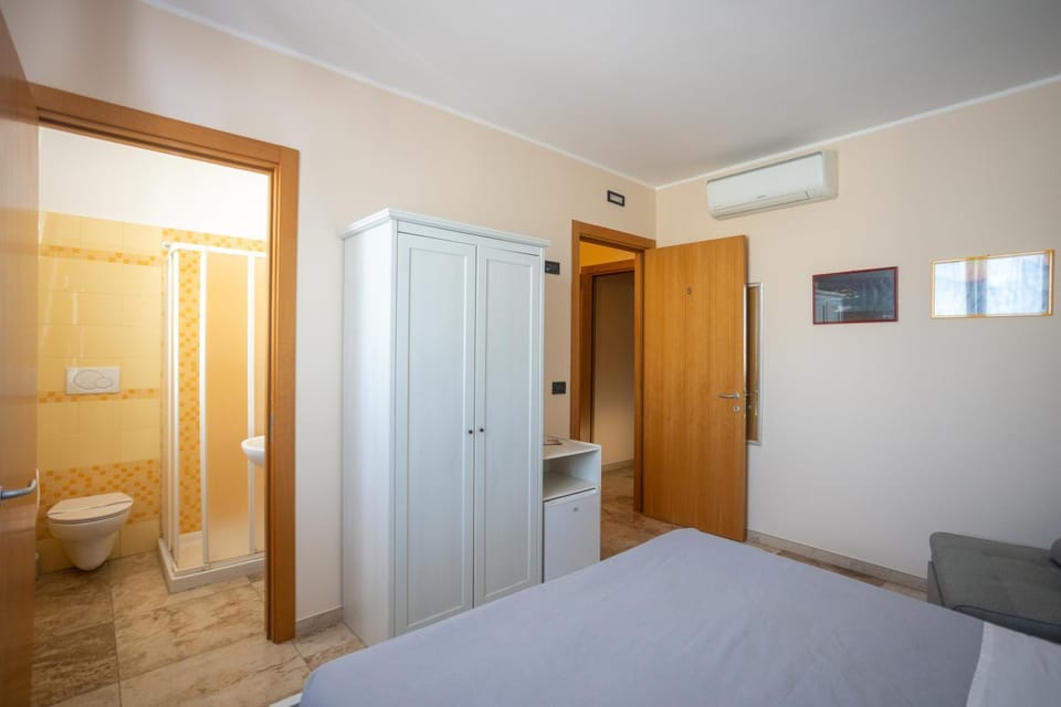 Shower, Toilet, Bed, Bathroom, Photo of the whole room, Bedroom, wardrobe