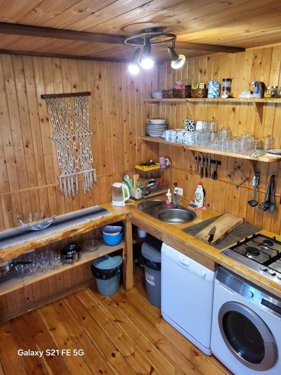 Kitchen or kitchenette, dishwasher, stove, washing machine