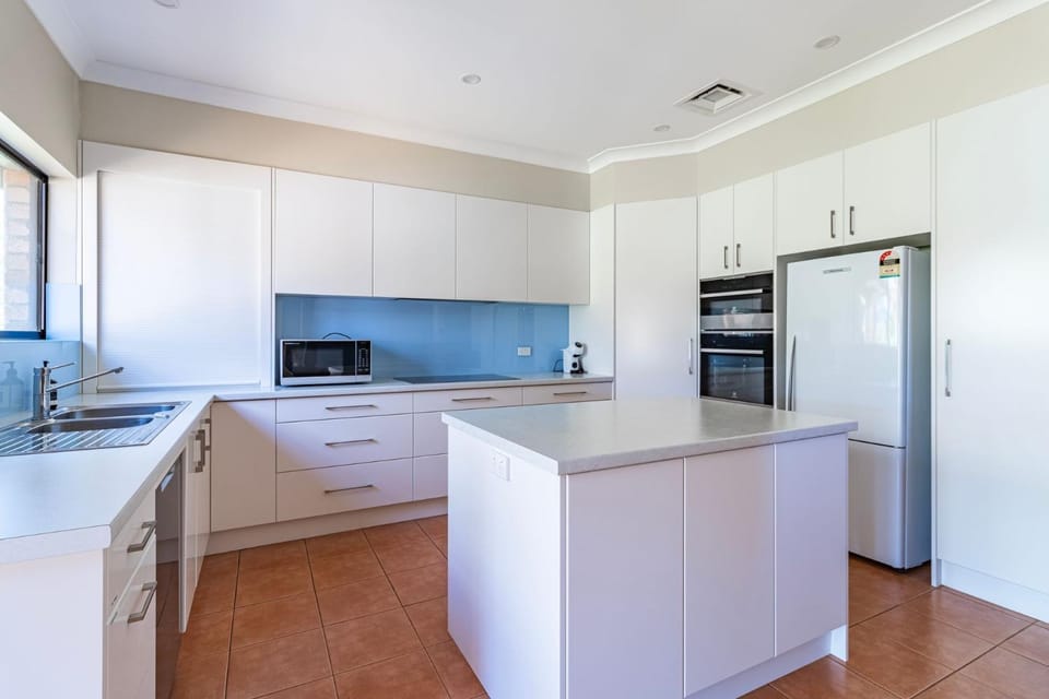 Kitchen or kitchenette, dishwasher, stove, toaster