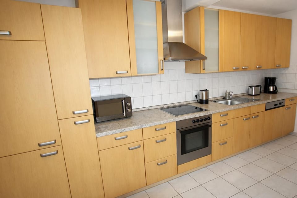 Kitchen or kitchenette, stove