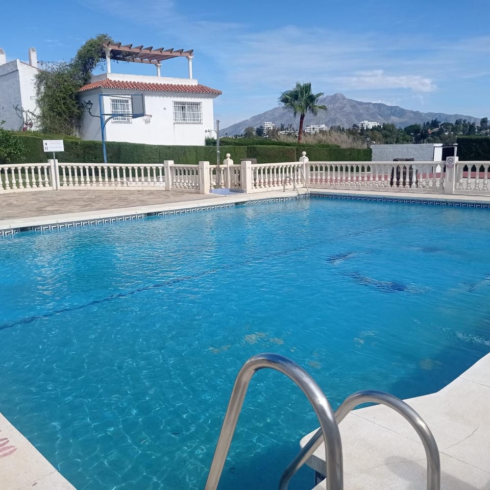 Property building, Patio, Day, Mountain view, Pool view, Swimming pool, sunbed
