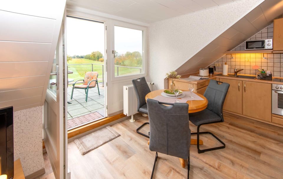 Coffee/tea facilities, View (from property/room), Kitchen or kitchenette, Living room, Seating area, Dining area, stove