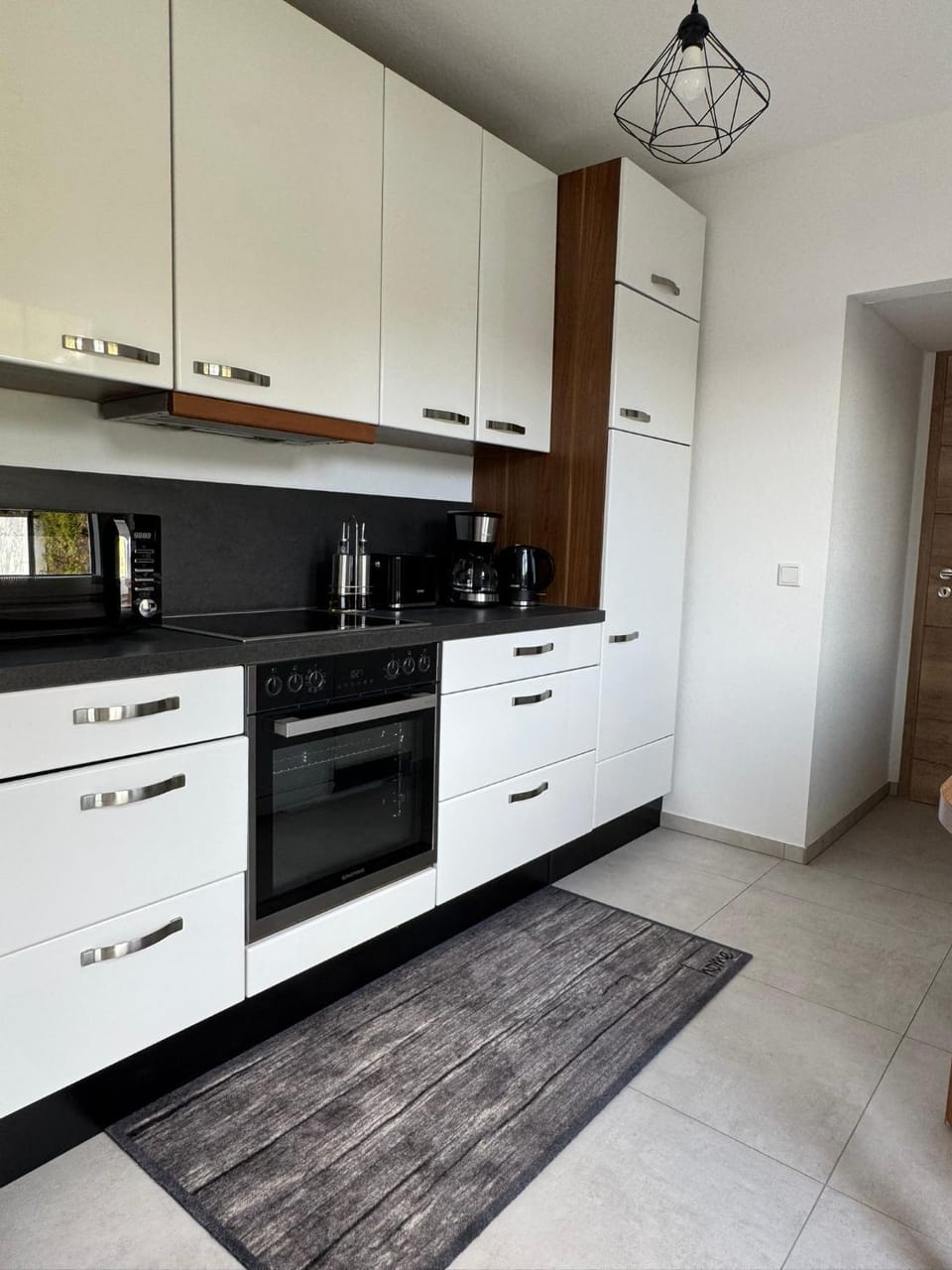 Kitchen or kitchenette, oven, stove
