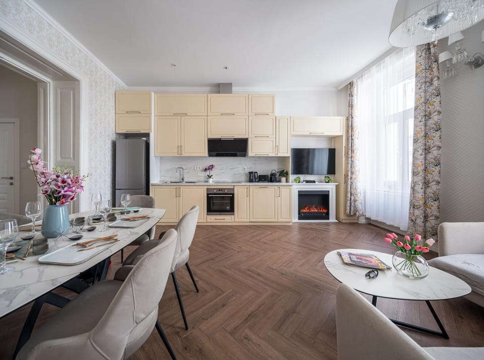 Living room, Dining area, dishwasher, fireplace, fireplace, oven, stove, toaster, kitchen