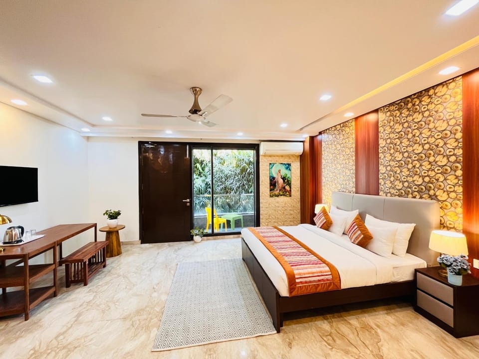 Communal lounge/ TV room, Bed, TV and multimedia, Living room, Photo of the whole room, Seating area, Evening entertainment, Bedroom, air conditioner
