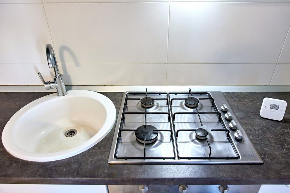 Kitchen or kitchenette, stove