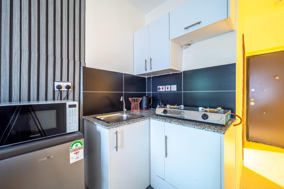 Kitchen or kitchenette, microwave
