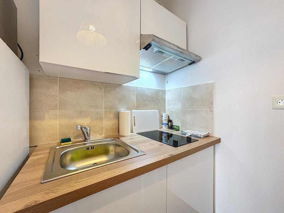 Kitchen or kitchenette, stove