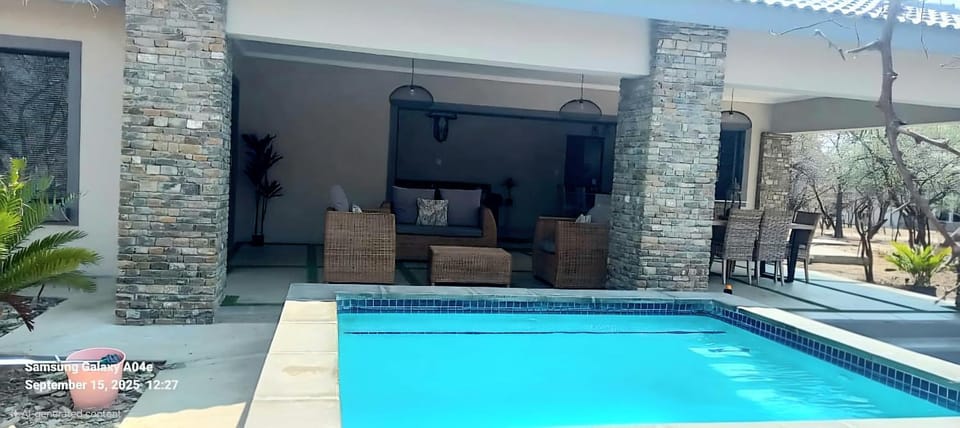 Property building, Patio, Swimming pool