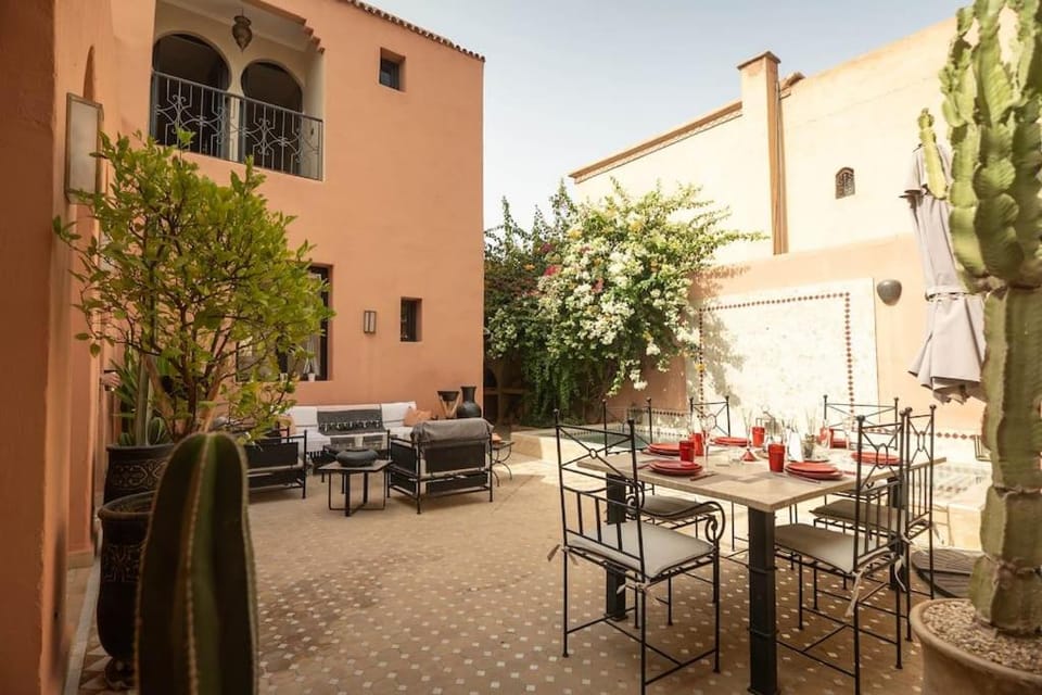 Property building, Patio, Living room, Dining area