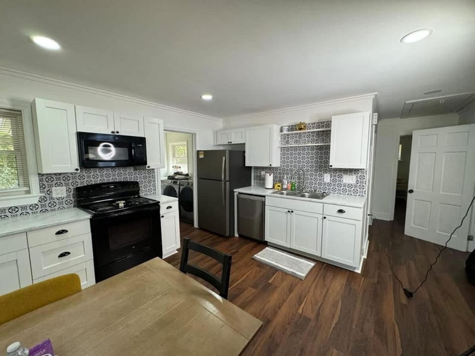 Kitchen or kitchenette, dishwasher, oven, stove, toaster