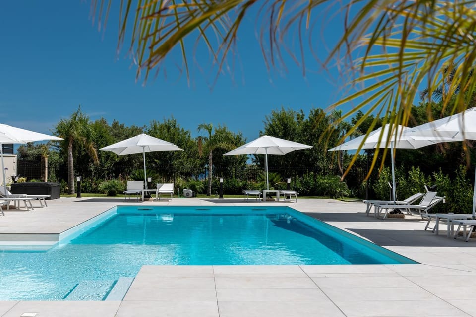 Property building, Living room, Swimming pool